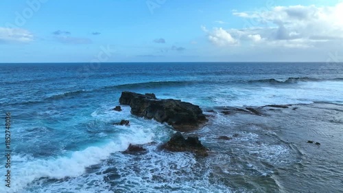 Aerial view Coastal Waves and Cloudscape with the tropical shoreline waves background