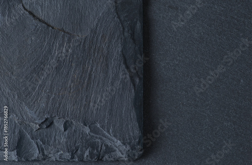 Two different grey stone textures with varying degrees of roughness and layering