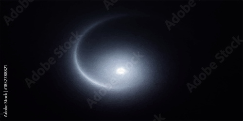 Moon glowing in the night sky with clouds