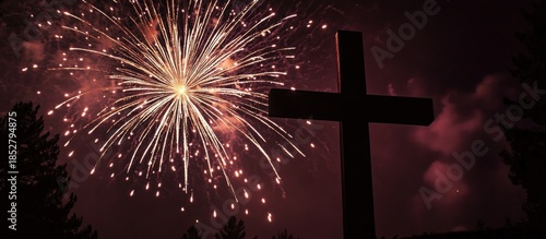 Wallpaper Mural Silhouetted Christian Cross Against Night Sky with Bright Fireworks Display Torontodigital.ca