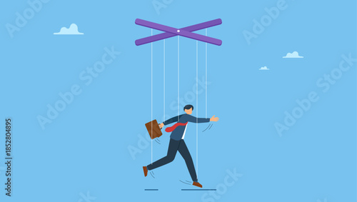 Businessman pretending to be smart with rope or string as puppeteer doll controlled or influence by power boss. Business management, people manipulation or power to dominate actions.