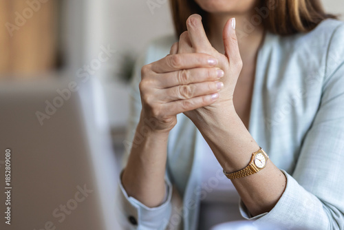 Business woman, hands and wrist pain with injury for carpal tunnel syndrome or strain in home. Female person, freelancer or remote work with sore joint, inflammation or sprain for overworked muscle.