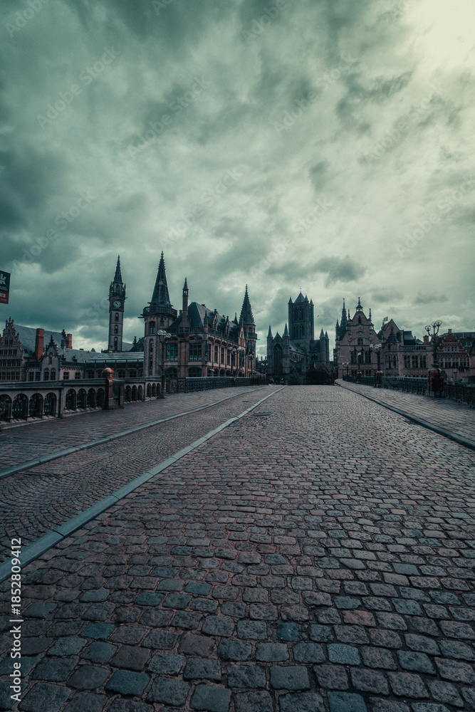 Obraz premium Magical medieval city of Ghent, Belgium. Scenic historic old town with canals, castle and gothic architecture in a festive winter atmosphere.