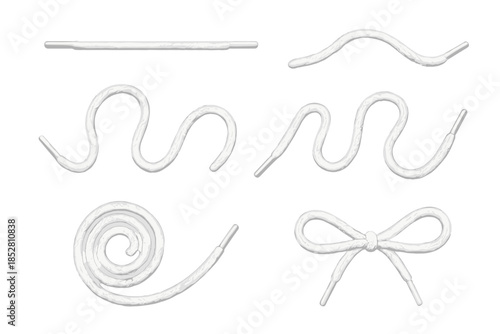 White Shoelaces in Various Shapes on Gray Background