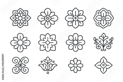 Collection of elegant floral ornamental icons on dark background