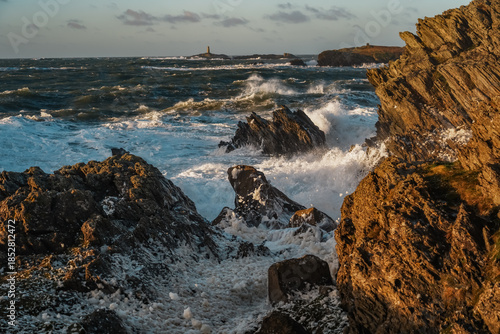 Sunrise at Rhoscolyn with rough seas Anglesey North wales