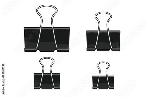 Four black binder clips on a grey background