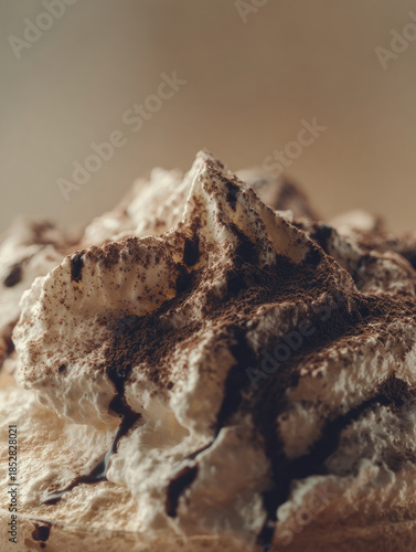 Dessert topped with whipped cream and chocolate syrup drizzle