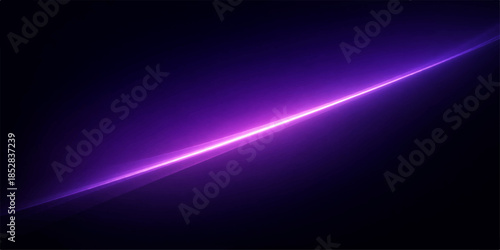 Purple light beam shining diagonally across a dark background