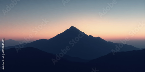 Silhouette of mountain peak at sunset with colorful sky