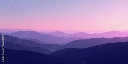 Purple and pink hues over layered mountain ranges at sunset