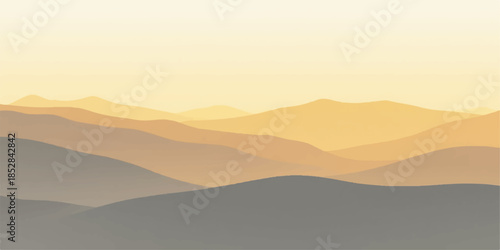 Sunset over a range of rolling hills and mountains
