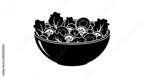 Black bowl filled with leafy greens.