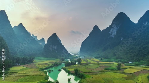 Hyperlapse aerial drone view of rice terrace paddle field around the river at Phong Nam, Trung Khanh, Cao Bang, Vietnam
