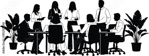 Silhouette of diverse business team members collaborating in a modern office around a conference table with laptops and indoor plants.