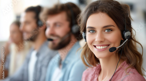Faceless call center group of casual dressed operators at work, business woman in headset at customer service office, telesales in business, telemarketing team, defocused people, w