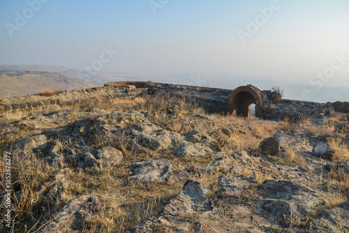 Fortress on a hilltop. Ruined castle. Old architecture.