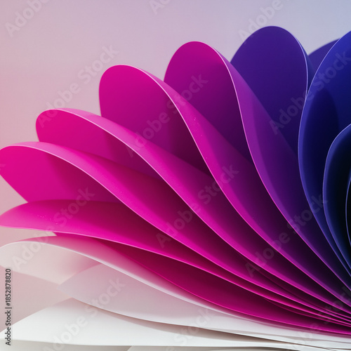 Colorful paper fan display in gradient shades of pink and purple  