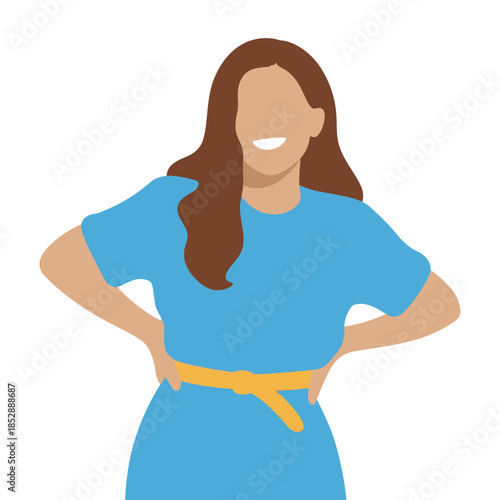 A smiling woman with brown hair wearing a blue dress and a yellow belt stands with her hands on her hips.