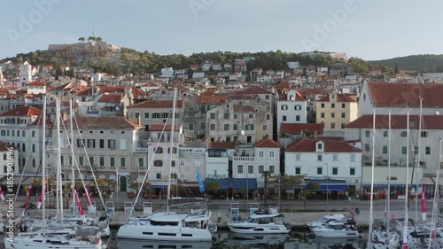 Sibenik, Croatia - November 01, 2022: Flying over waterfront of Sibenik