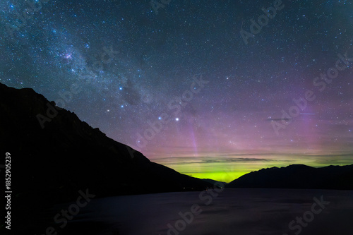 Fotografie Night sky over Lake Wakatipu with Milky Way and Southern Light, Aurora Australis