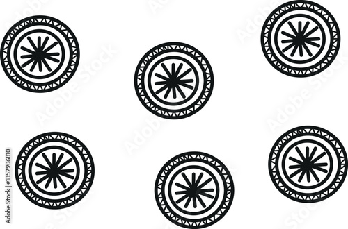 Five identical black and white circular designs with starburst patterns