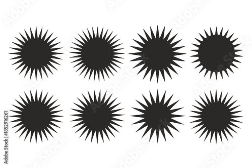 Eight identical black spiky starburst shapes are arranged in two rows on a white background.
