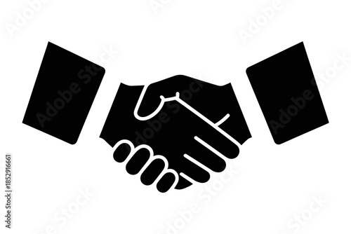 Two silhouetted hands shaking in agreement and partnership