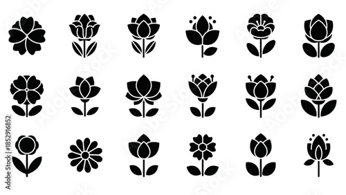 A vintage black silhouette set of trees with floral leaves butterflies and decorative tribal nature elements