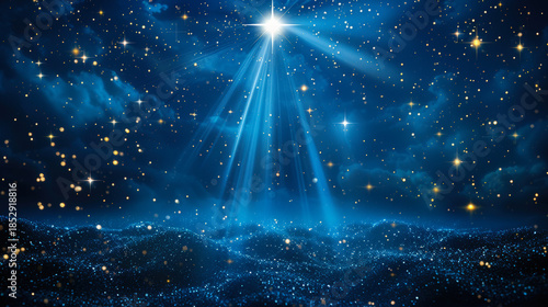 Christmas Star of Nativity of Bethlehem on background of starry sky. Star of Jesus with rays of light. Mockup for Christmas greeting card. Copy space.