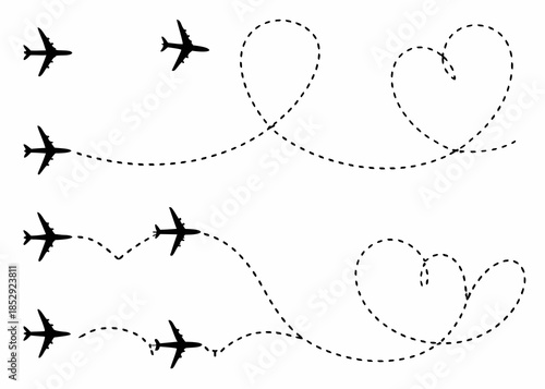 Airplanes tracing flight paths and hearts in a simple black and white illustration