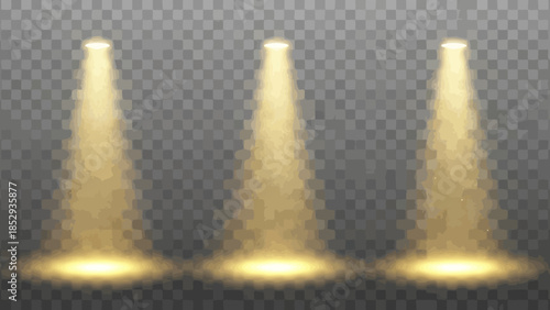 Three golden spotlights shine brightly on a transparent background creating dramatic illumination
