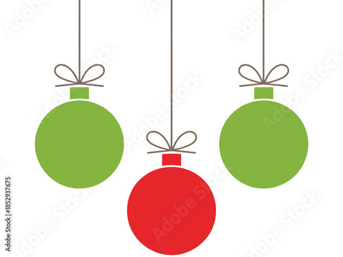 Three Christmas ornaments hang suspended from strings, with one red and two green.