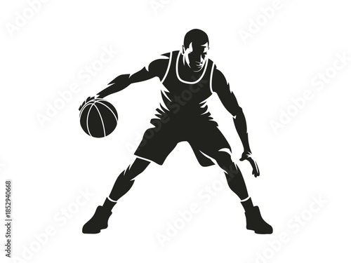 A silhouetted basketball player dribbles the ball with intensity and focus.