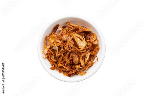 Crispy fried shallots on white bowl,staple condiment of Southeast Asian cuisine isolated on white background with clipping path
