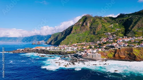 Wallpaper Mural Drone footage of Porto Moniz town along the Atlantic coast of Madeira Island with turbulent ocean conditions Torontodigital.ca