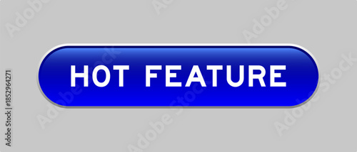 Blue color capsule shape button with word hot feature on gray background
