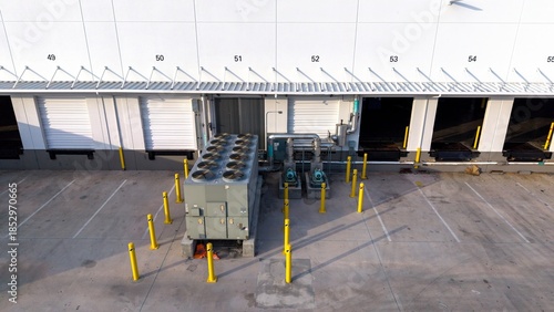 Industrial air conditioning vent. HVAC. Commercial cooling HVAC air conditioner condenser fan units climate control and refrigeration temperature system, outside cold storage warehouse