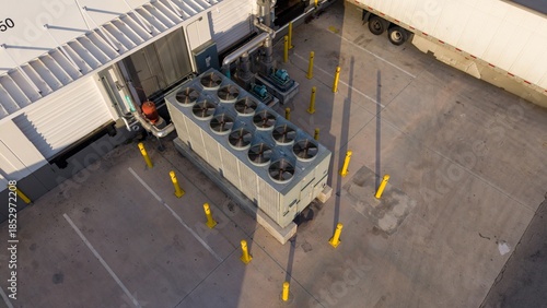 Industrial air conditioning vent. HVAC. Commercial cooling HVAC air conditioner condenser fan units climate control and refrigeration temperature system, outside cold storage warehouse