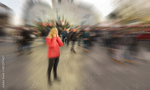 Blond woman is having stress, anxiety, fear or panic attack in public. Mental health disorder. Phobia of crowd of people. Schizophrenia, agoraphobia or paranoia.