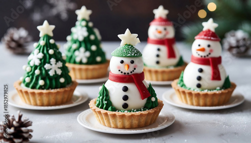 Christmas cupcakes with snowman and snowflakes, selective focus