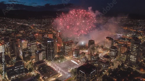 Vibrant urban skyline at night illuminated by colorful fireworks, creating festive celebration filled with excitement