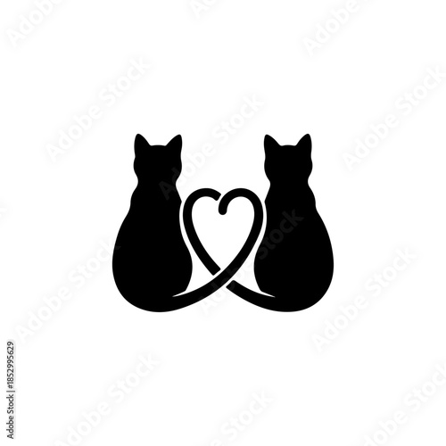 Two Black Cats Form A Heart Shape With Tails.