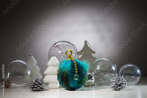 Christmas card with Christmas decorations and transparent balls. With space for text
