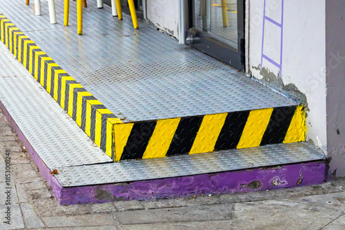 A stair strip edge trim, attaches to the front edge of a stair tread providing visual contrast effectively defining the edge of each step