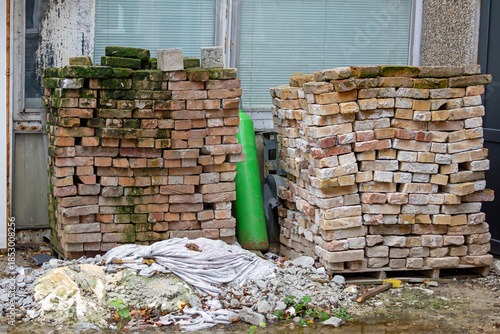 Reclaimed bricks that have been cleaned and removed from old buildings often have worn and irregular edges from their previous use