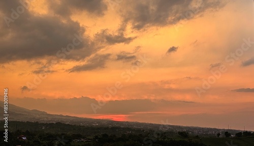 A scenic view of  colorful sunset sky. Serene vibrant sunset.