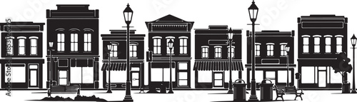 Quaint small town street with shops and street lamps