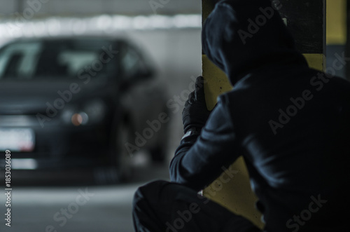 Photography Person Hides in Parking Garage While Watching Parked Car at Night