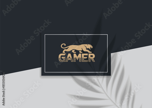 Game Identity: An elegant gold emblem of a jaguar, poised with power, boldly represents the word GAMER over a dark background. Symbolizing strength and precision